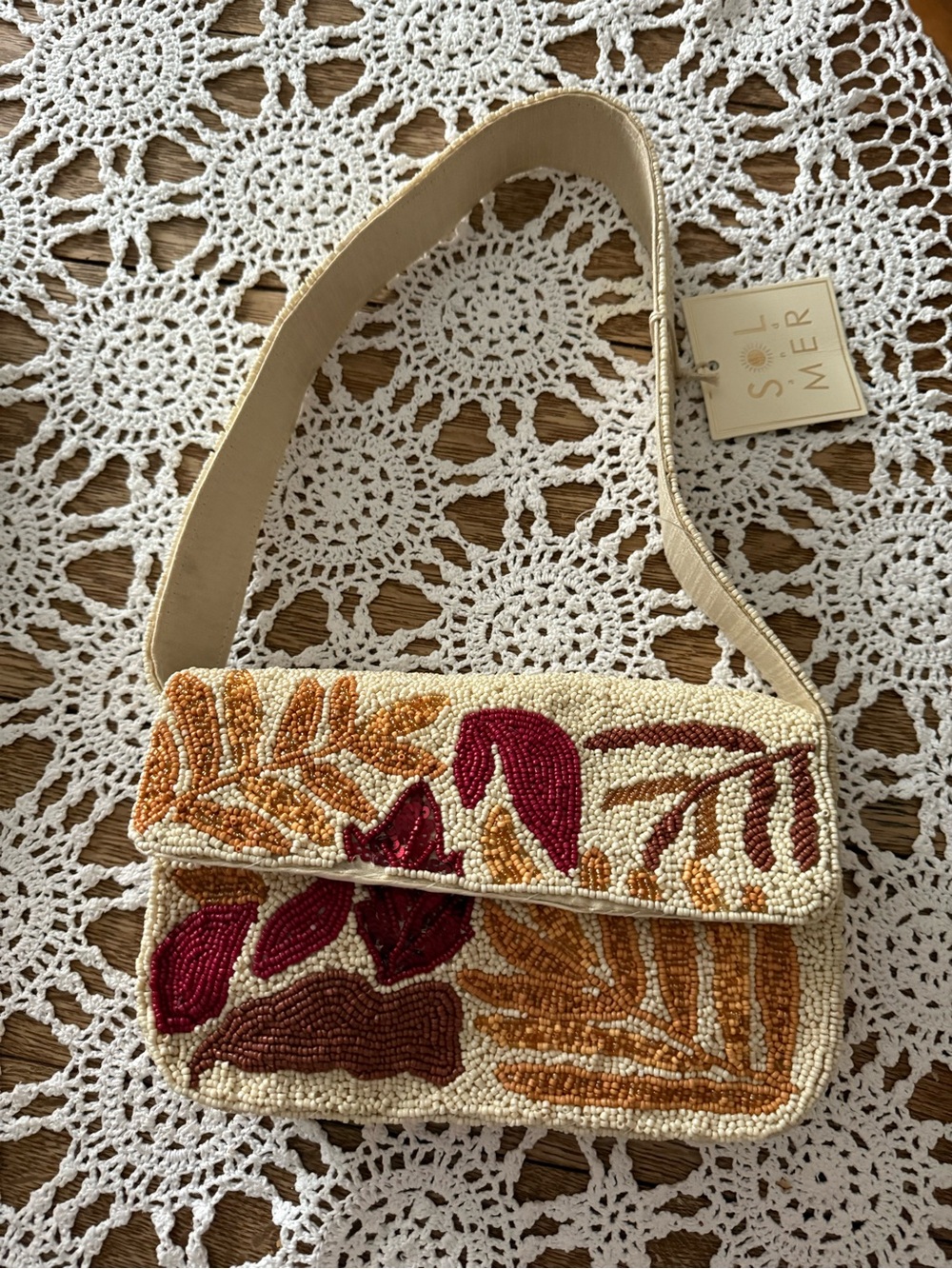 Sol and Mer Beaded Crossbody Bag in Cream, Burgundy and Gold